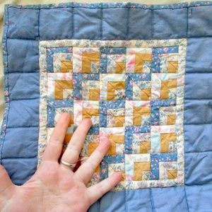 handmade quilt for a doll, Log Cabin style, blues and golds, cotton, pieced